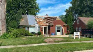 home in process of roof repair and replacement